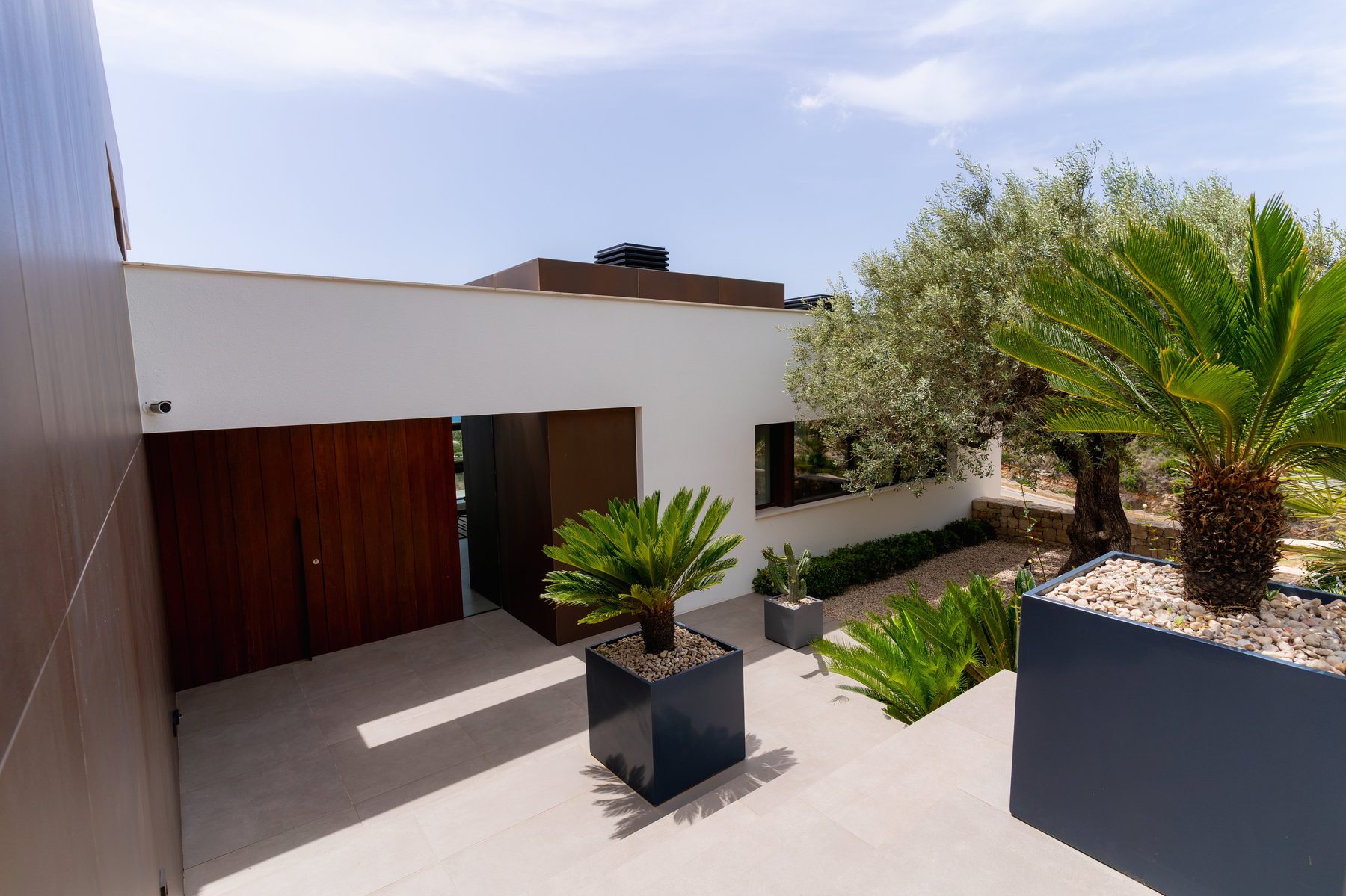 An entrance that captures the essence of the Mediterranean landscape