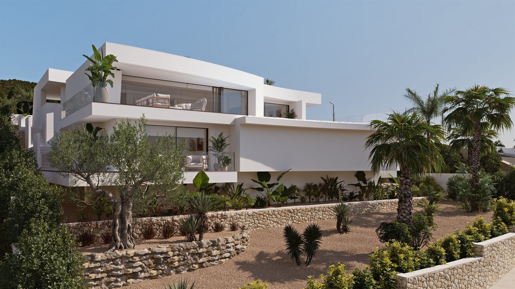 Mediterrane Vegetation umgibt das Haus und verstärkt seine Verbindung zur Landschaft