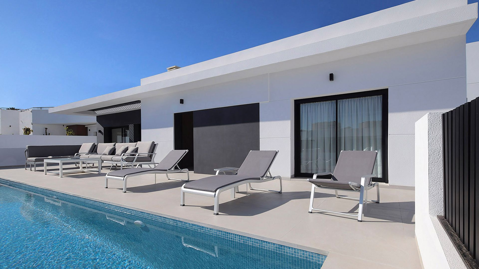 Villa with pool and sun loungers