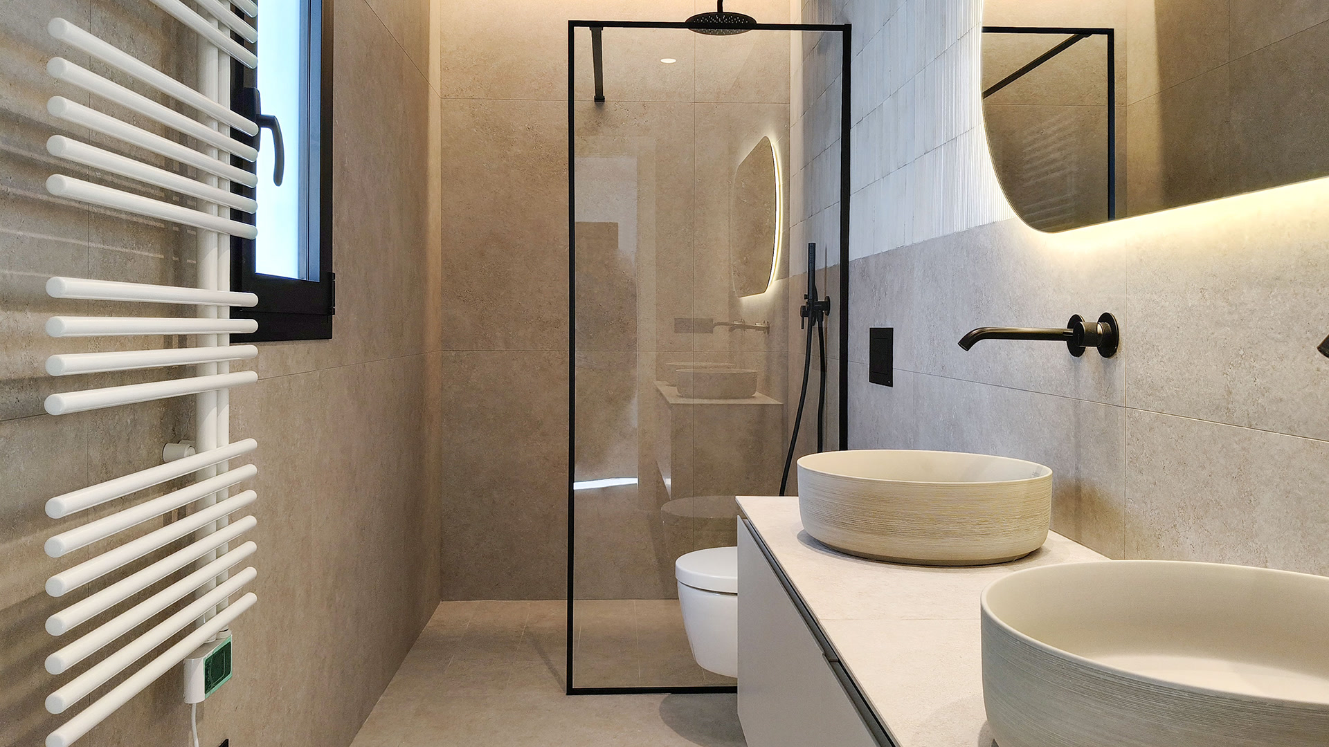 Bathroom with shower and towel radiator